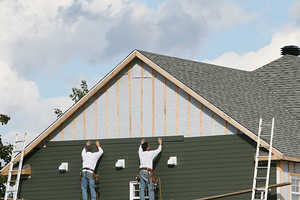 Professional Siding technician working in Spring Lake, NC